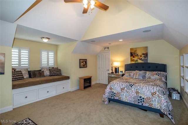 bedroom featuring ceiling fan, light carpet, and lofted ceiling