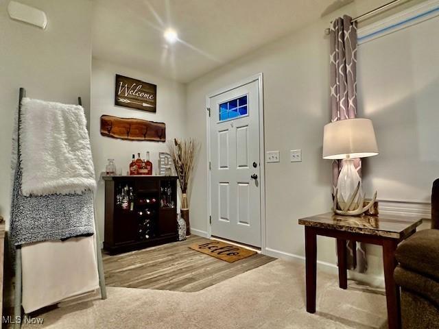 foyer entrance featuring hardwood / wood-style floors