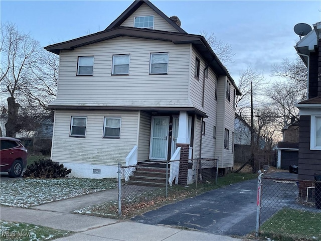 view of front of house featuring crawl space and fence