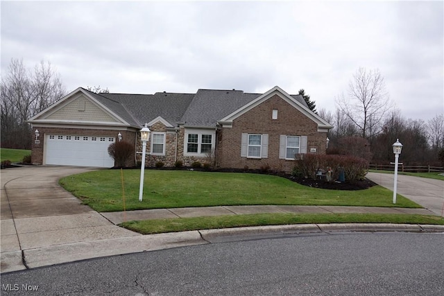 ranch-style house with a garage and a front lawn