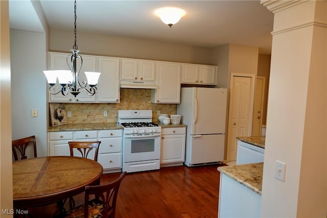 kitchen with tasteful backsplash, white appliances, pendant lighting, dark hardwood / wood-style floors, and white cabinetry