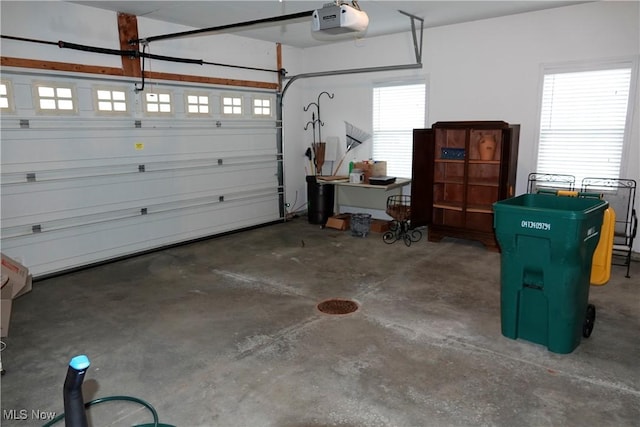 garage featuring a garage door opener