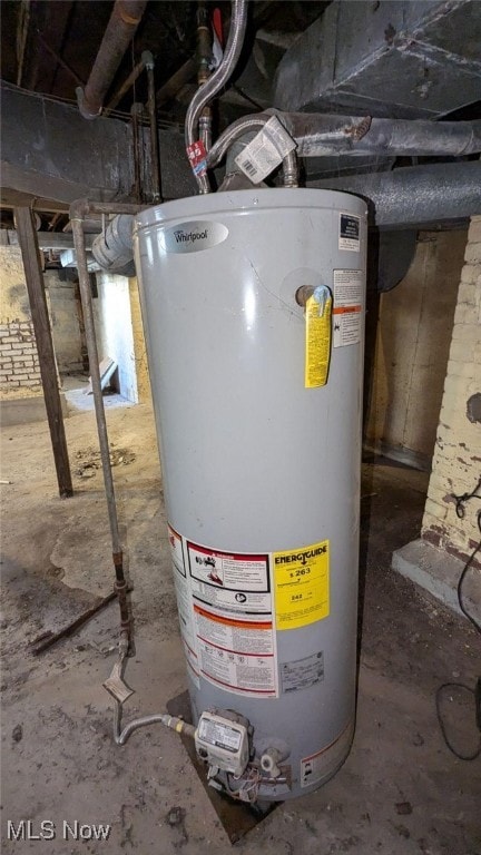 utility room featuring gas water heater