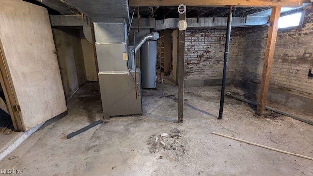 basement with heating unit and water heater