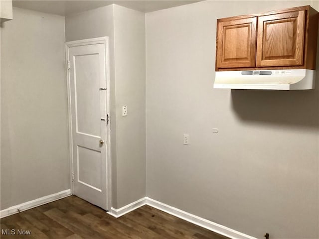 washroom with dark hardwood / wood-style flooring