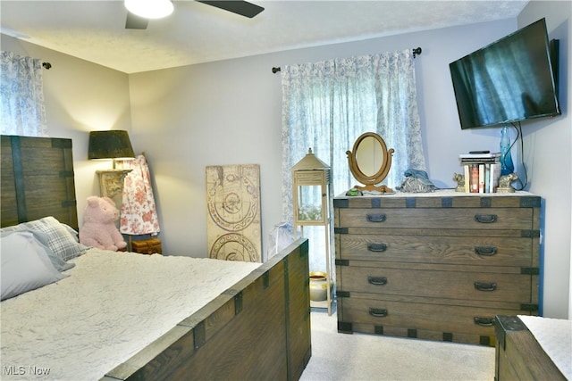 bedroom featuring ceiling fan