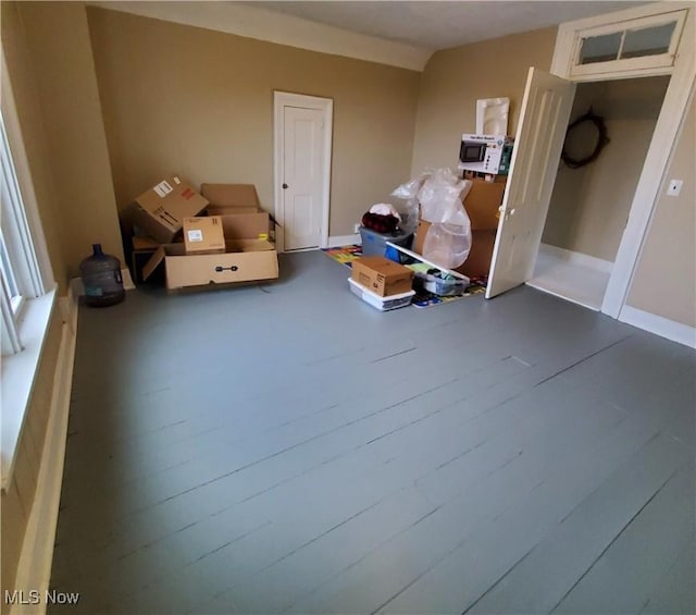 interior space with wood-type flooring and lofted ceiling