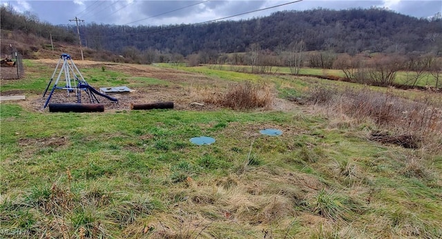 property view of mountains with a rural view