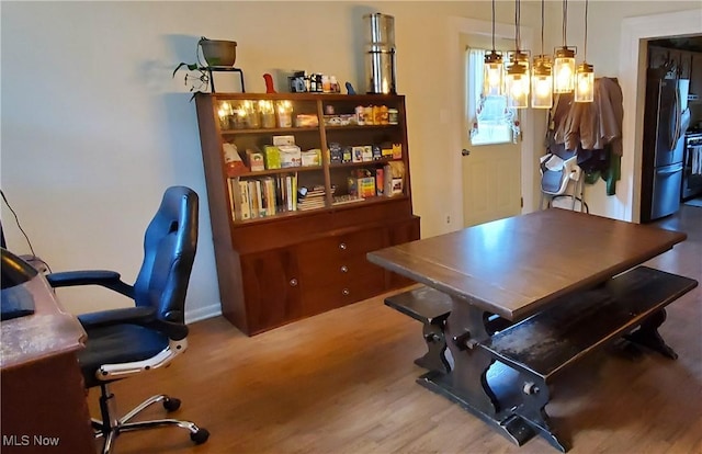 office space with hardwood / wood-style flooring