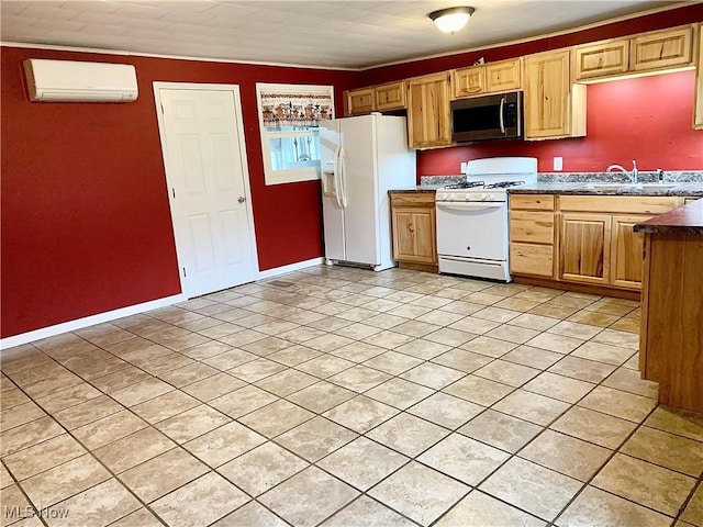 kitchen featuring a wall mounted air conditioner, light tile patterned floors, white appliances, and sink