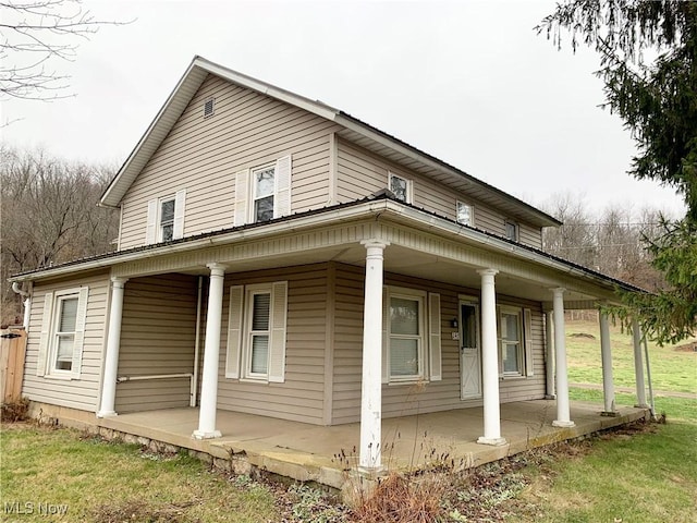 view of home's exterior with a porch