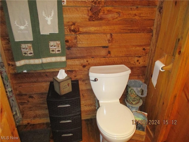 71352 Skyline Dr, Piedmont, OH 43983 - bathroom with wood walls and toilet