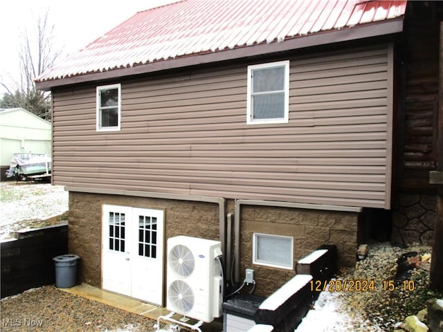 71352 Skyline Dr, Piedmont, OH 43983 - rear view of property featuring ac unit and metal roof