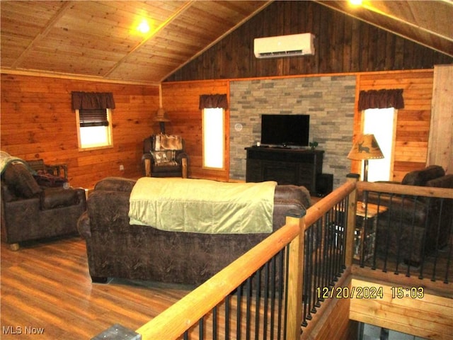 71352 Skyline Dr, Piedmont, OH 43983 - living room with wooden walls, a wall mounted air conditioner, wooden ceiling, wood finished floors, and lofted ceiling