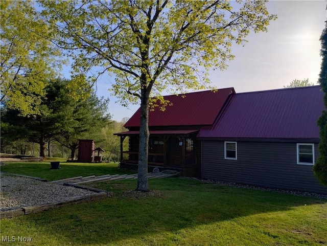 71352 Skyline Dr, Piedmont, OH 43983 - back of house featuring a yard and metal roof