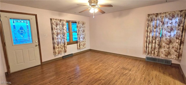 entrance foyer featuring hardwood / wood-style flooring and ceiling fan