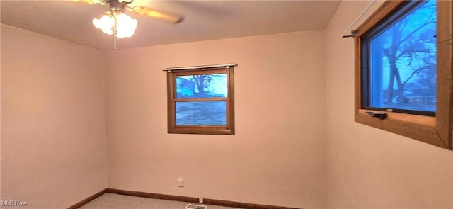 empty room featuring ceiling fan