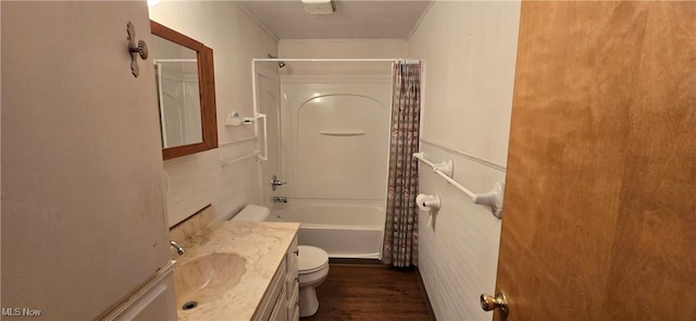 full bathroom with hardwood / wood-style flooring, shower / bath combo, toilet, and vanity