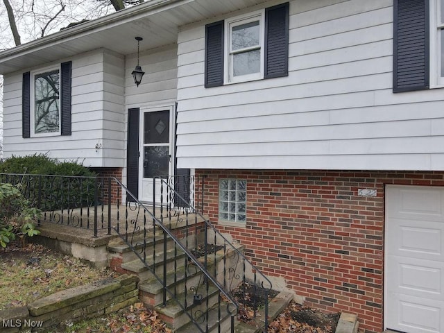 property entrance featuring a garage