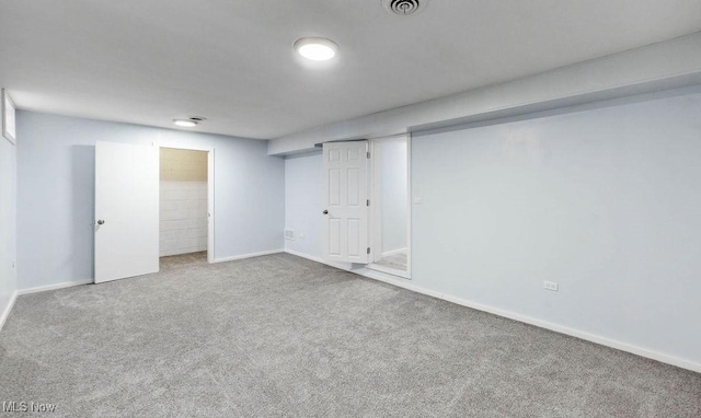 basement with carpet flooring