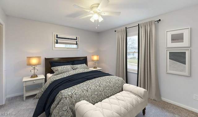 bedroom featuring light carpet and ceiling fan