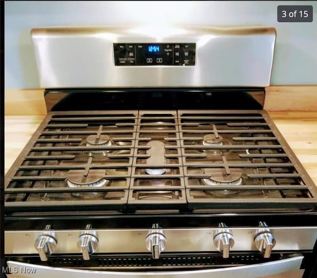 room details featuring stainless steel range with gas stovetop