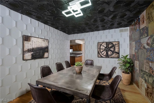 dining area featuring light hardwood / wood-style floors