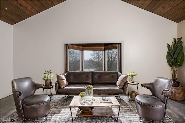 living room with high vaulted ceiling and wood ceiling