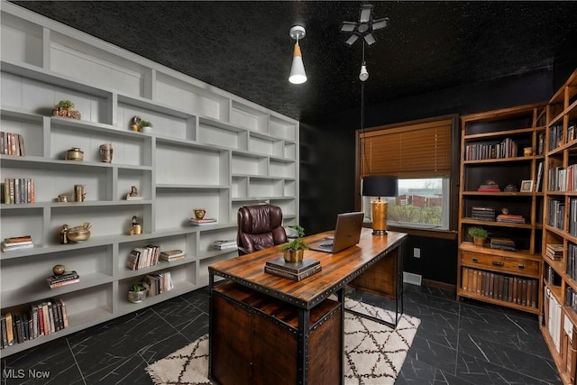 office space featuring a textured ceiling