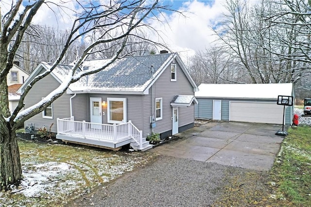 view of front of property with an outbuilding and a garage