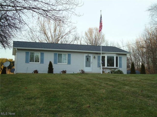 ranch-style house with a front yard