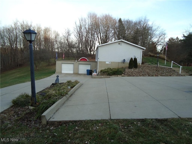 view of home's exterior with a garage