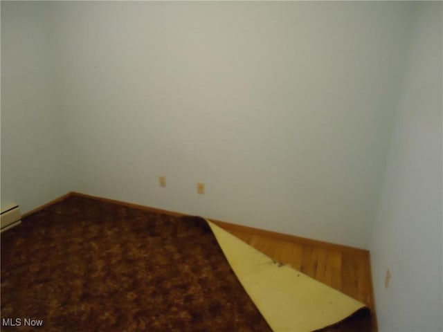 unfurnished room with carpet flooring