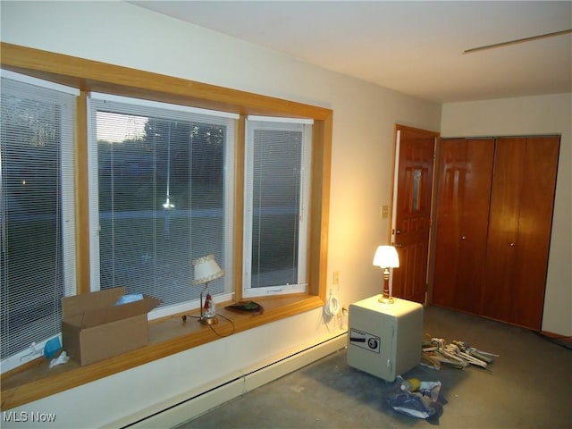 interior space featuring a closet and a baseboard radiator