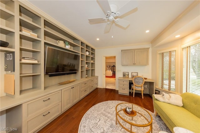 living room with dark hardwood / wood-style floors, ceiling fan, and crown molding