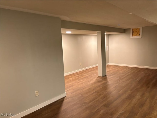 basement with wood-type flooring