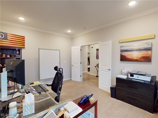 office area with light colored carpet and ornamental molding