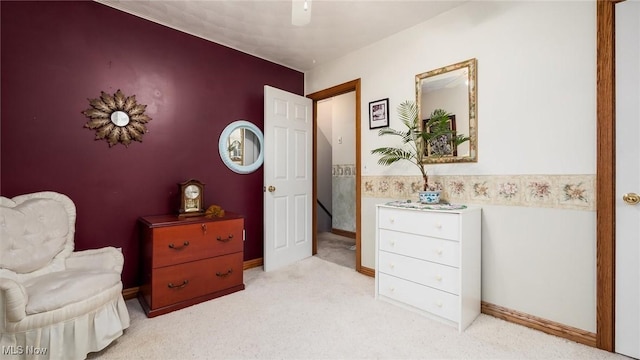 living area featuring light colored carpet