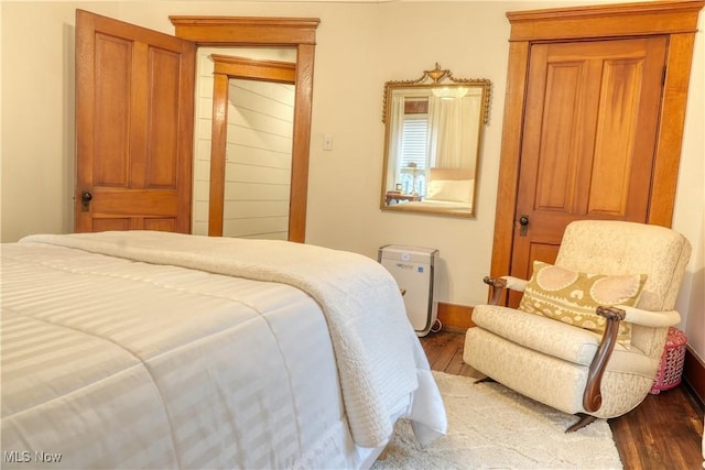 bedroom featuring hardwood / wood-style flooring