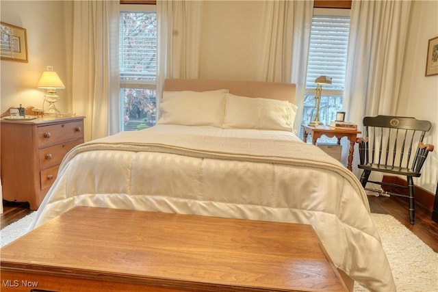 bedroom featuring hardwood / wood-style flooring