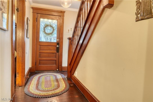 doorway to outside featuring dark hardwood / wood-style flooring and crown molding