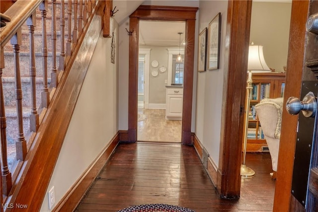 hall with dark hardwood / wood-style floors