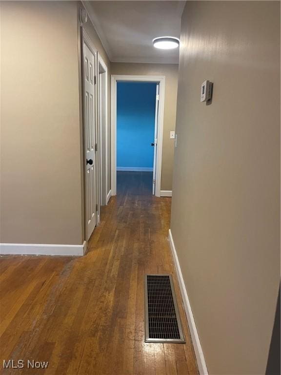 hall featuring dark wood-type flooring