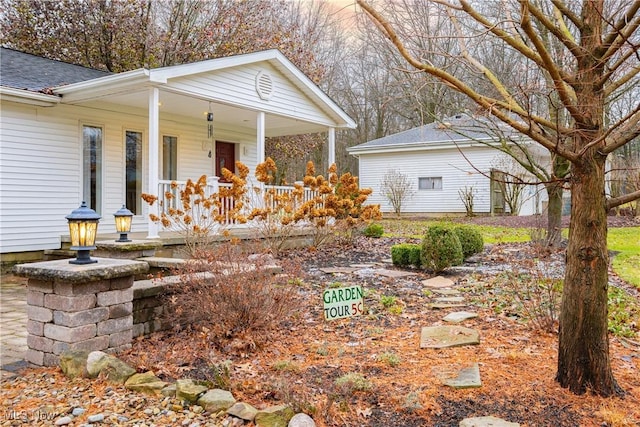 view of home's exterior with covered porch