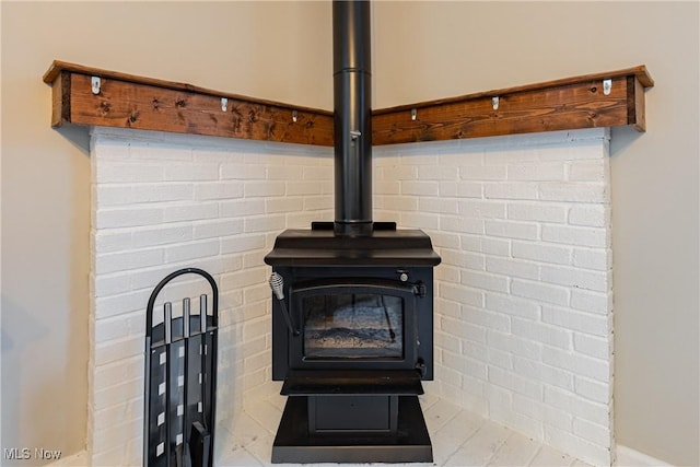 interior details featuring a wood stove