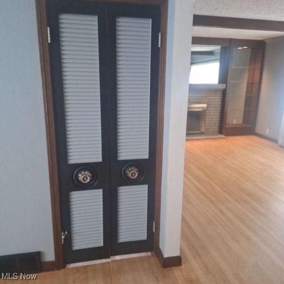 interior details with hardwood / wood-style floors and french doors