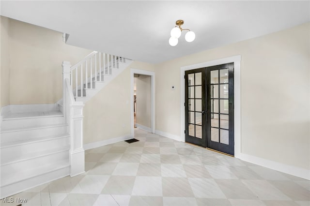 entryway featuring french doors