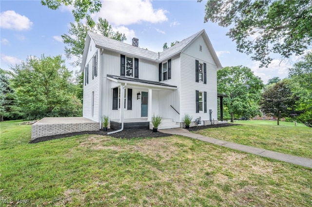 view of front of home with a front yard