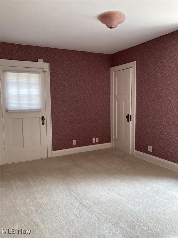 view of carpeted spare room