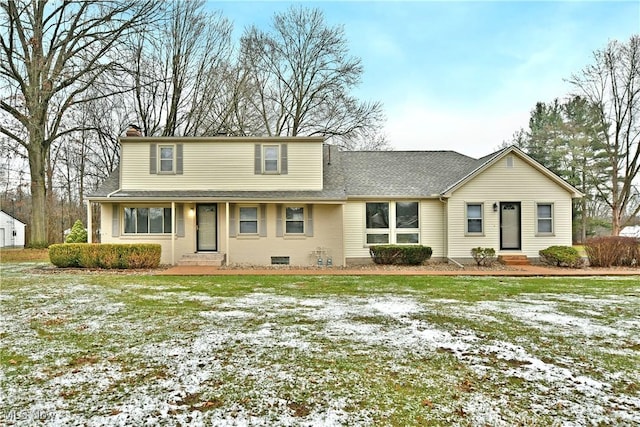 view of property featuring a yard